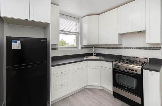 Building Photo - 55-05 Woodside Ave