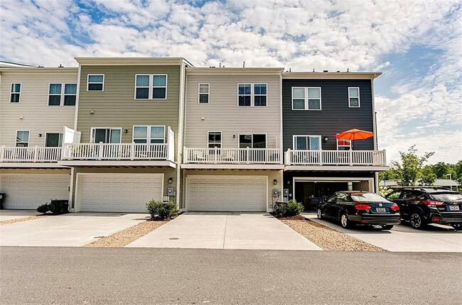 Building Photo - Beautifully Designed Townhome with Modern ...