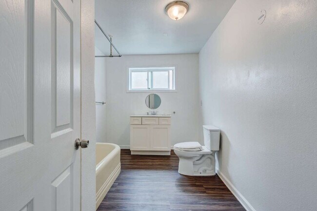 Building Photo - Stylishly Renovated Retro Duplex in the He...