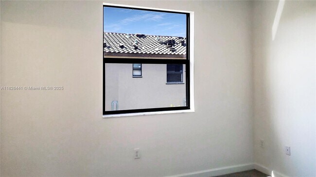 Building Photo - 24970 SW 112th Ct