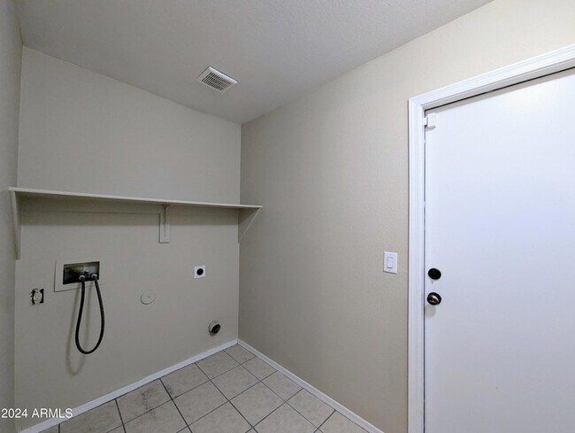 Building Photo - 7059 W Gardenia Ave