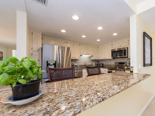 Building Photo - 675 S Gulfview Blvd