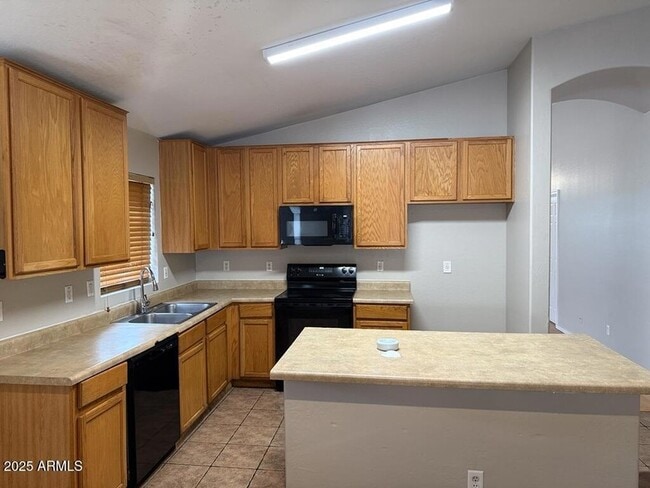 Building Photo - 10504 W Hughes Dr