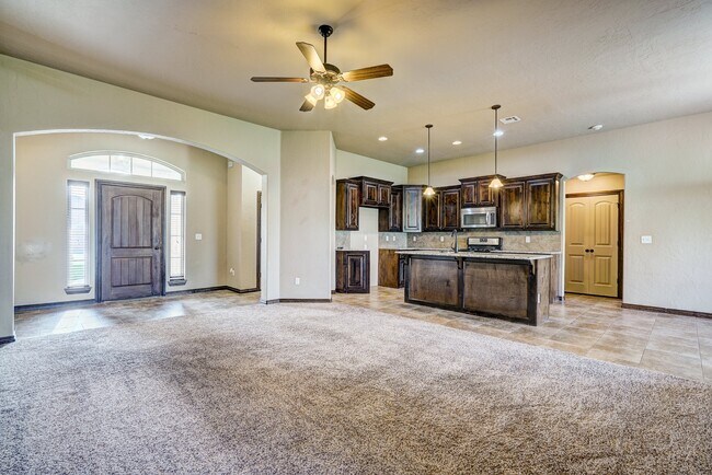 Building Photo - AVAILABLE THE END OF APRIL! 3 OR 4 BDRM, 2 BATHRM, 2 CAR & STORM SHELTER