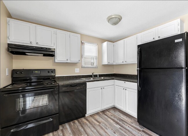 Building Photo - Woodsedge Condominiums