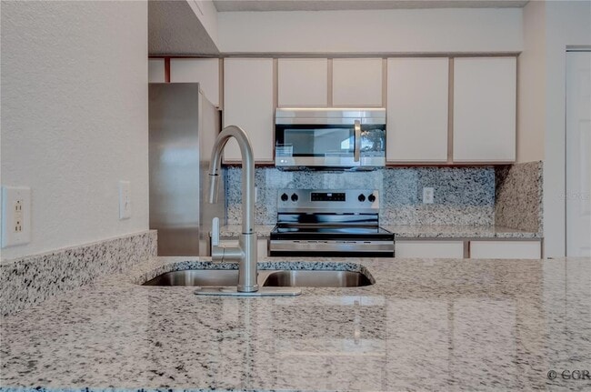 Building Photo - 2210 Grand Cayman Ct