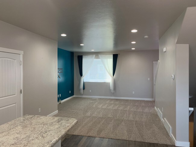 Living room from kitchen - 3657 W Sunrise Sky Ln