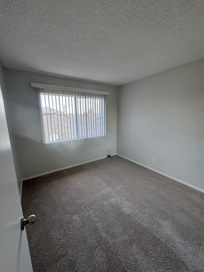 Building Photo - COMING SOON! 3 Bed + 1.5 Bath Townhouse