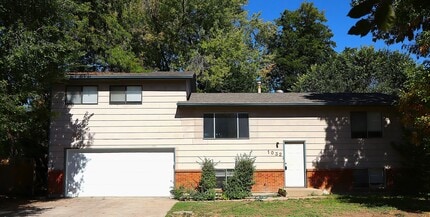Building Photo - Beautiful Split-Level 6BR Home with Attached Garage and Fenced Yard +$300 Off First Month!
