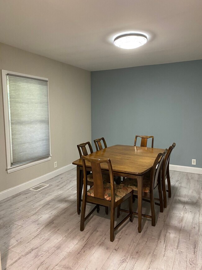 Table with leaf and 6 chairs can stay if needed - 5920 Kellogg Ave