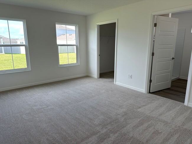 Building Photo - NEWER HOME adjacent to The Villages in all...