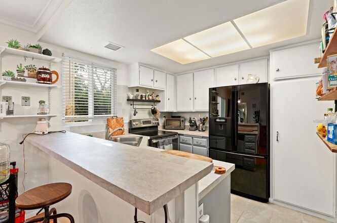 Building Photo - 6544 College Grove Dr