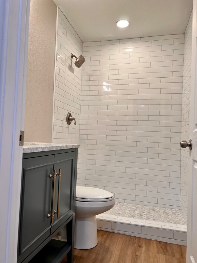 renovated bathroom with oversized shower - 1266 Dove St