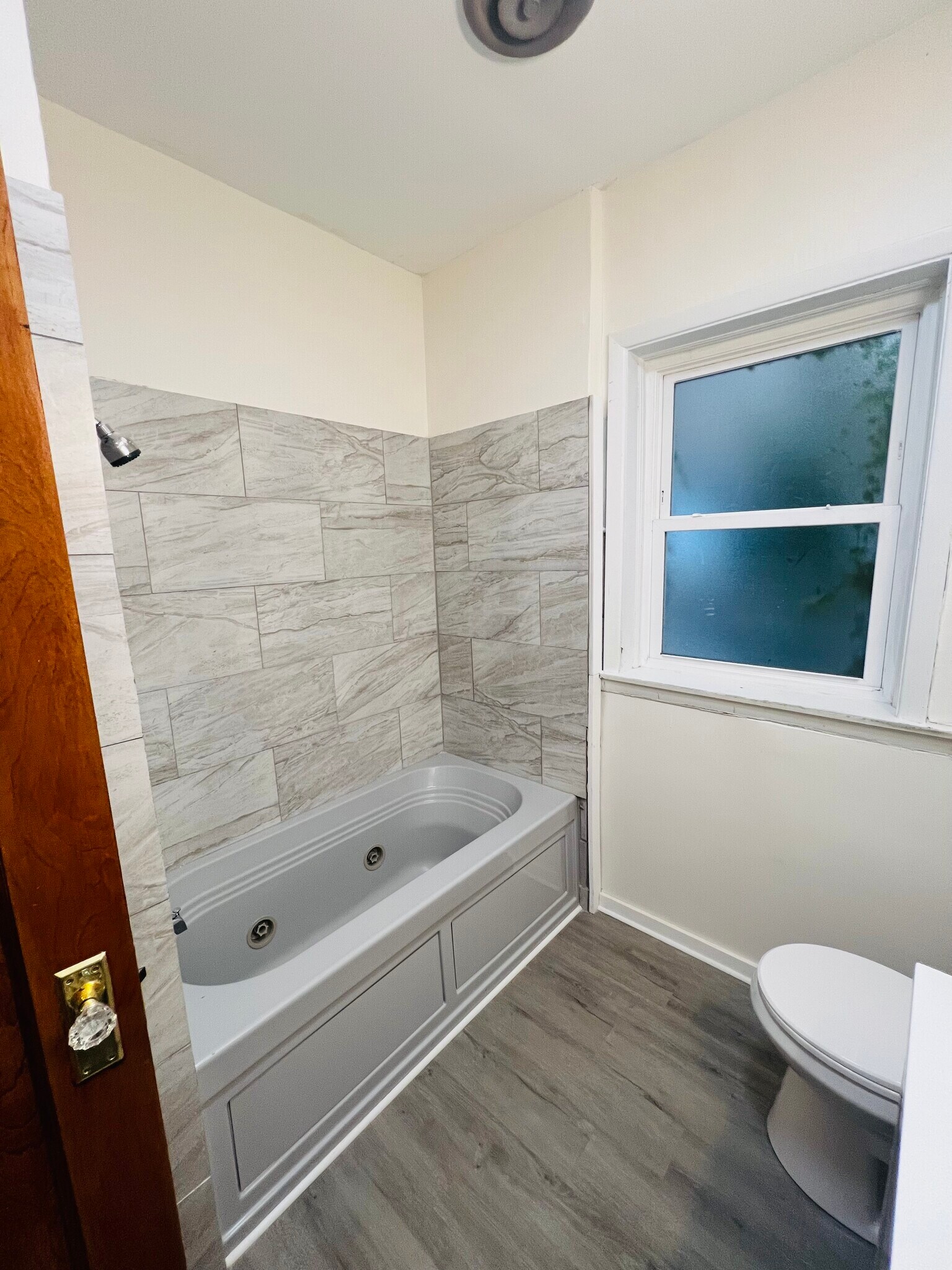 Bathroom on main level of apartment - 6937 S Merrill Ave