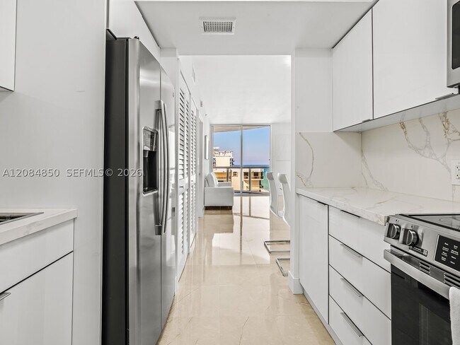 Building Photo - 6365 Collins Ave