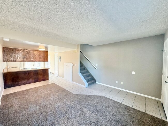 Building Photo - Two-Level 2BR with Fenced Yard & Washer/Dryer Hookups