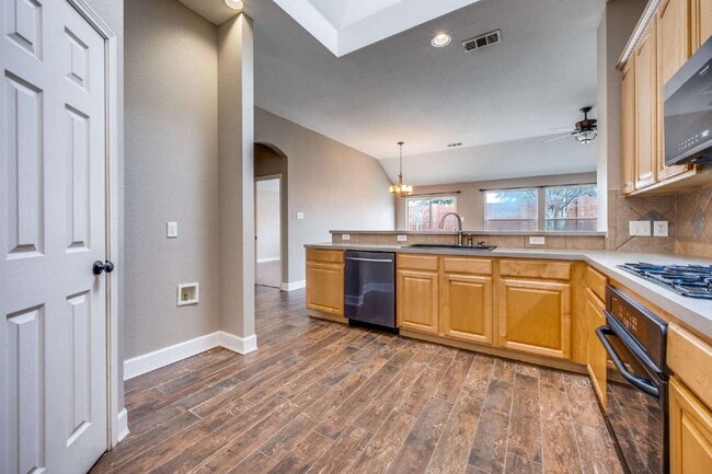 Building Photo - Modern Brick Home with Skylit Kitchen and Private Backyard