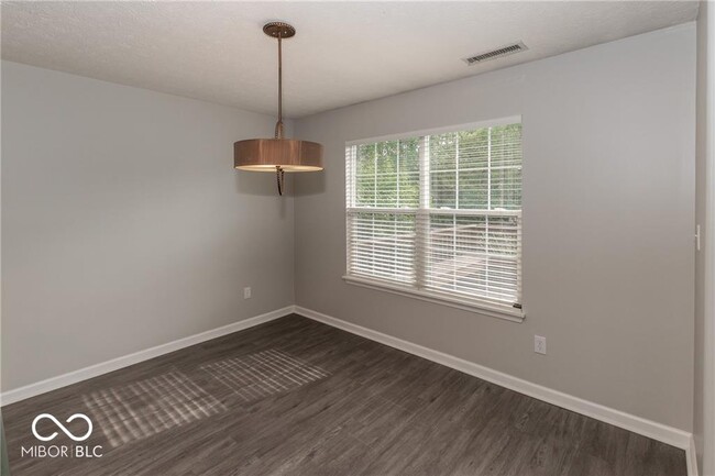 Building Photo - 9361 Eden Woods Ct
