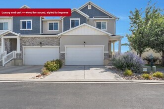 Building Photo - Modern Row End Townhome w 2 car attached g...