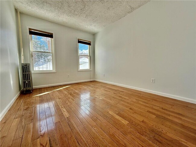 Building Photo - 8689 15th Ave