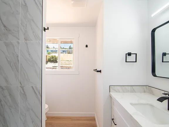 Building Photo - "Charming 5-Bed Sanctuary with Cozy Fireplace on South Rogers Street!"