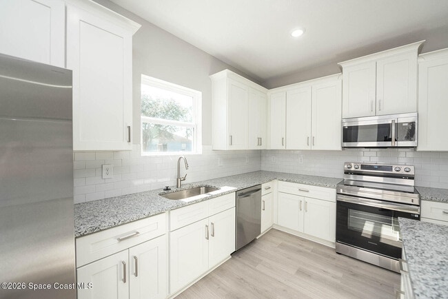 Building Photo - 1106 Homer St NW