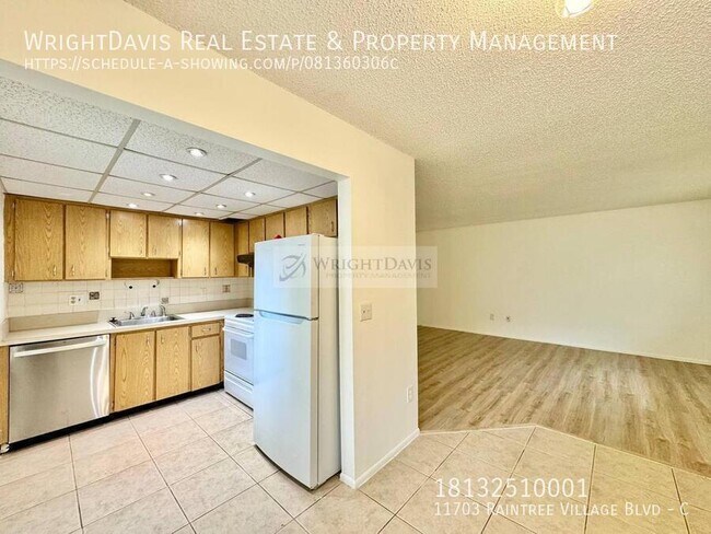 Building Photo - 11703 Raintree Village Blvd