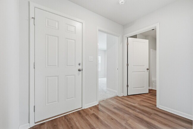 Building Photo - New community! Three bedrooms, two bathrooms and ready for you to move into!