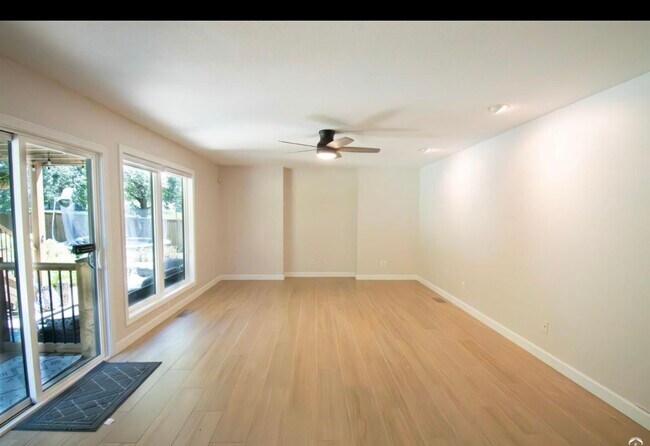 Family room open to kitchen with views of backyard - 1524 Foxfire Dr
