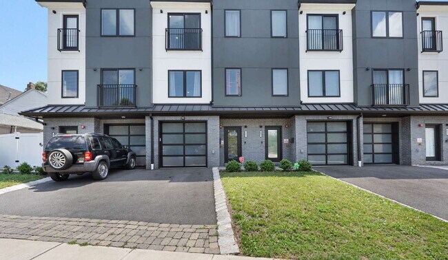 Building Photo - Movie in special, first 1/2 month rent is FREE! Charming 2-Bedroom Condo with 2 Full & 2 Half Bat...