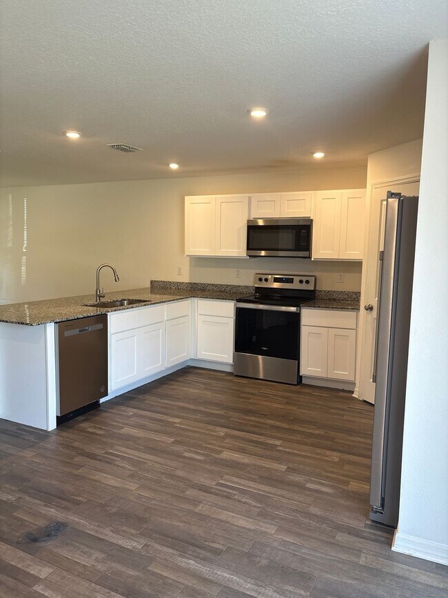 Building Photo - Spacious 4-Bedroom Home in Poinciana, FL –...