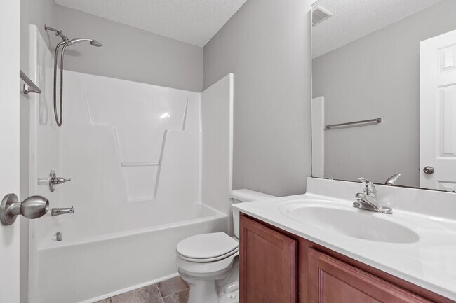 Building Photo - Charming 2-Bedroom 2.5-Bathroom Townhouse with Fenced Yard