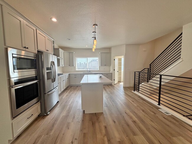 Building Photo - BRAND NEW TOWN HOME READY TO MOVE IN