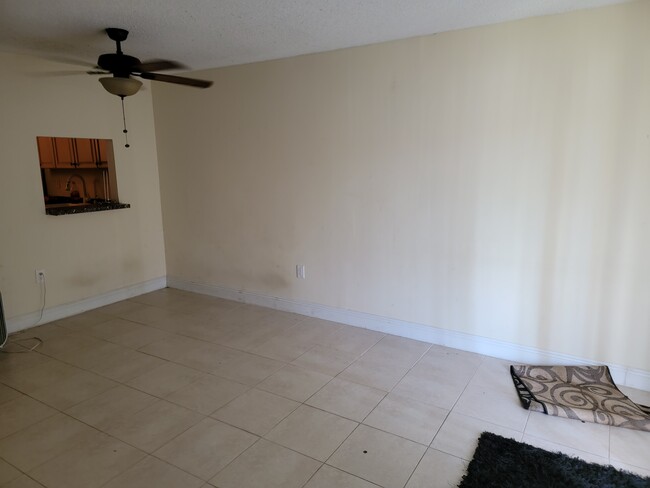 Living room, has been repainted but don't currently have updated picture. Same as the closet pictur - 4324 nw 9th ave