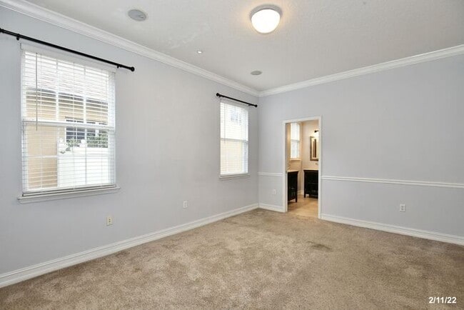 Building Photo - Luxurious 4/3 Waterfront Home with an In-ground Spa, an In-law Suite and a 2 Car Garage in the Hi...