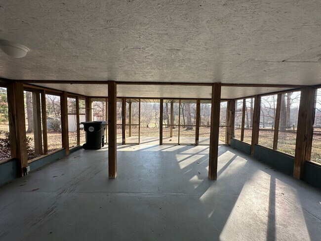 Building Photo - House in Bedford with Lot of Outdoor Space.