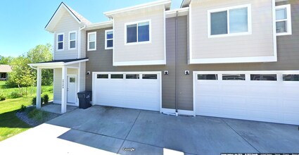 Building Photo - Pet Friendly! Gorgeous 3 Bedroom condo with double stall attached garages with AC.