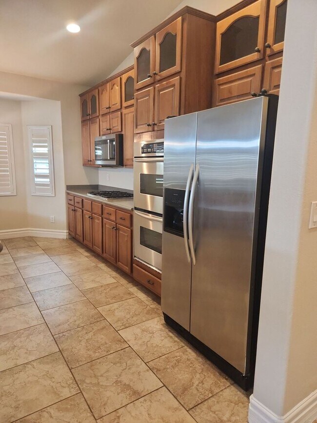 Building Photo - A Stunning 4 Bedroom Home with a Sparkling Pool