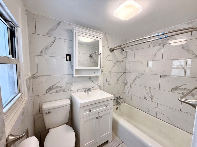 Building Photo - 61 Monitor St