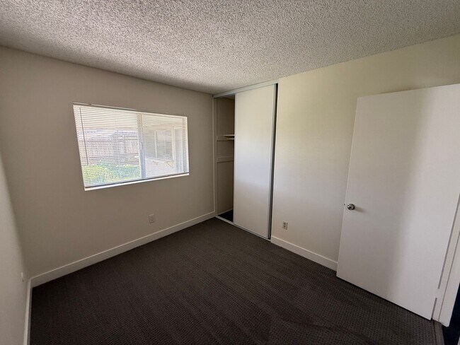 Building Photo - 4 Bedroom, 2 Bath Home with Large Yard + Two Car Garage