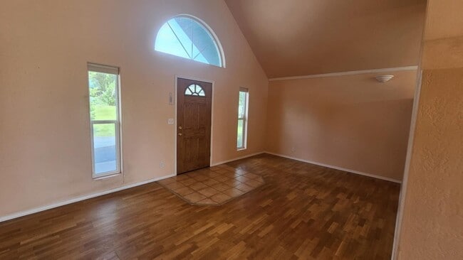 Building Photo - Out of town house with double garage and l...