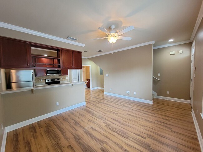 Building Photo - 3 Bedroom town home for rent August 6, 2026 in gated community with pool, renting for $1475 per m...
