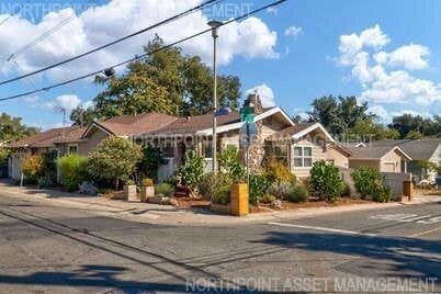 Building Photo - Welcome to this stunning 4-bedroom, 2-bath...