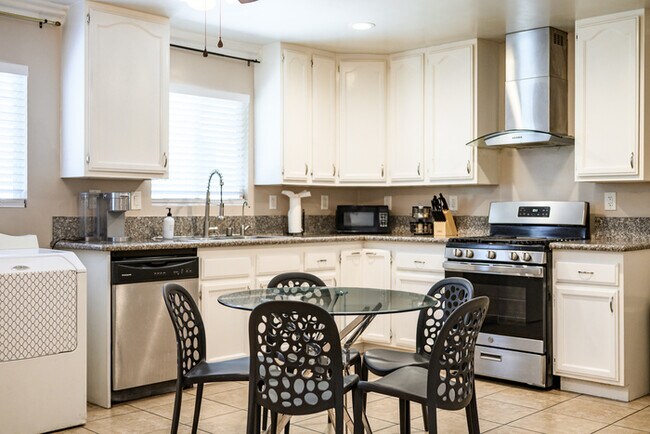 Building Photo - Fully Furnished 2BR Home with Crib — Mid-T...