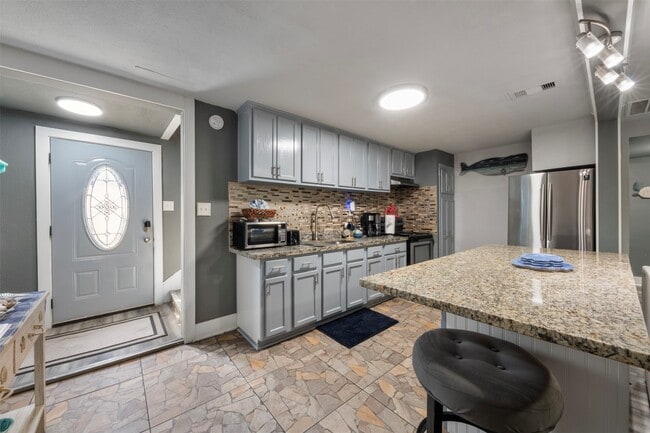 Building Photo - 3218 Ave Q 1/2