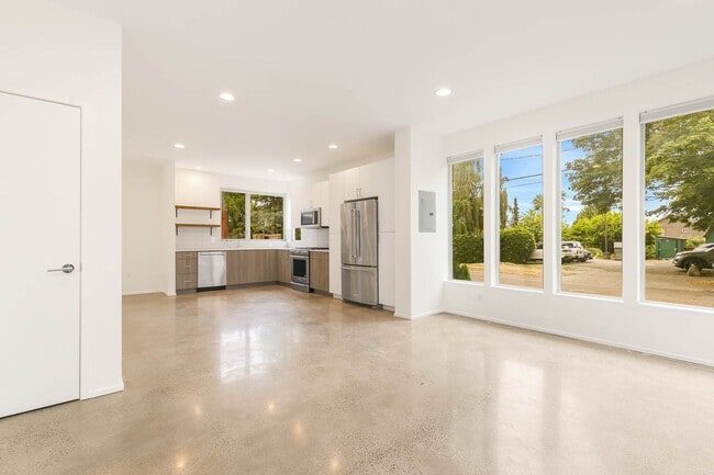 Building Photo - 3 Bedroom Modern Industrial Townhome with City Views & Rooftop Oasis