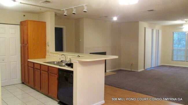 Building Photo - ENJOY THIS BEAUTIFUL CONDO NESTLED IN THE ...