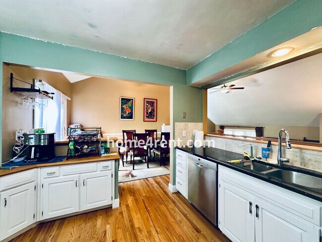Building Photo - A Lovely, Four Bedroom Lenexa Home w/ Wood...