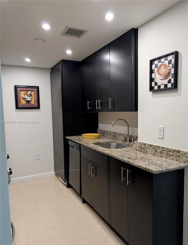 Building Photo - 10275 Collins Ave