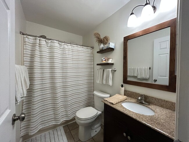 Building Photo - 5059 E Woodmill Dr